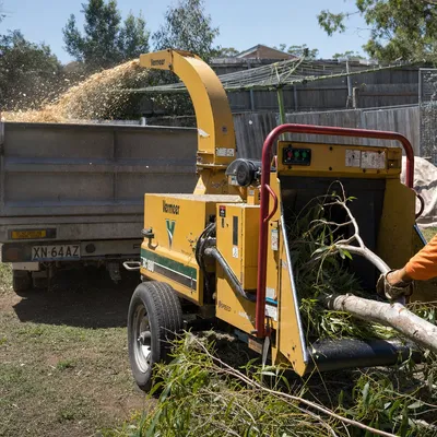 Mulching & Wood Chipping in Mackay. On-site chipping of branch material and bulk mulch delivery across Mackay. Fresh hardwood or aged compost mulch, priced by the cubic metre.